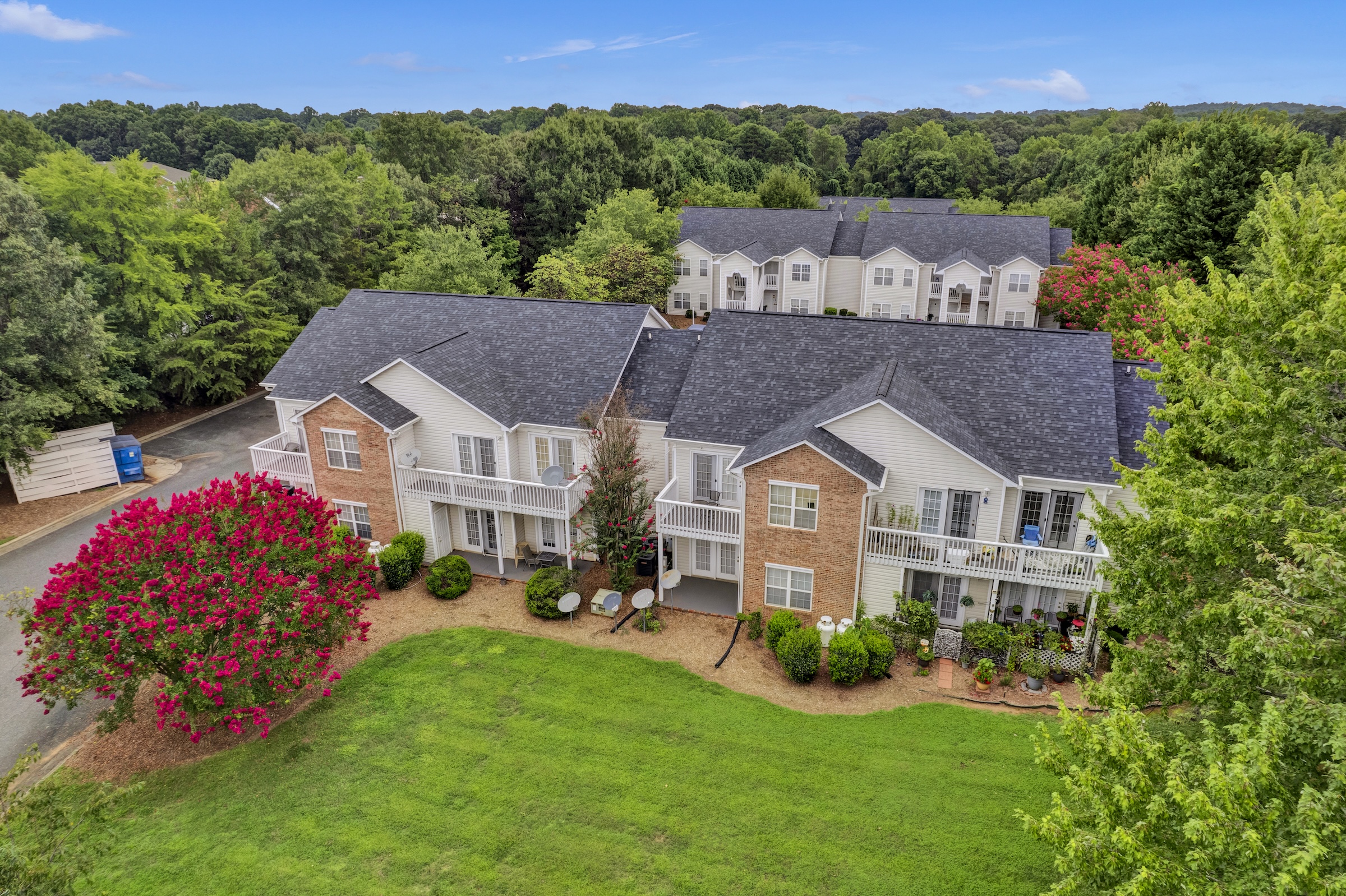 Aerial view showing lawns of Village of Moss Creek 